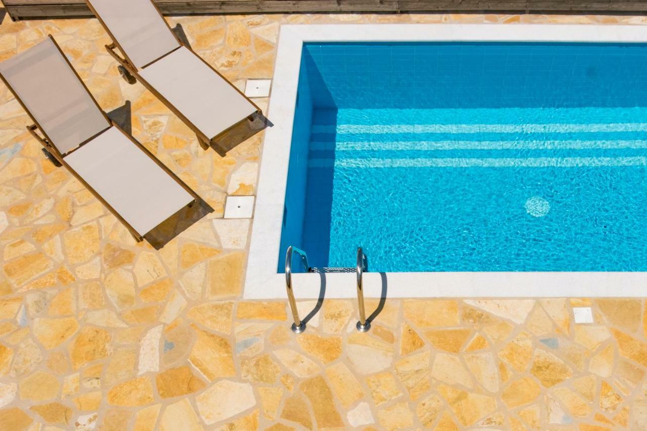 Amoya Villas Stoúpa Buitenkant foto
